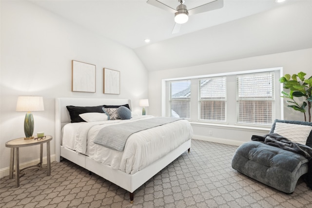 carpeted bedroom with lofted ceiling and ceiling fan