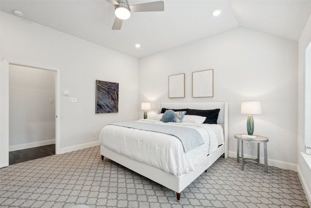 carpeted bedroom with lofted ceiling and ceiling fan