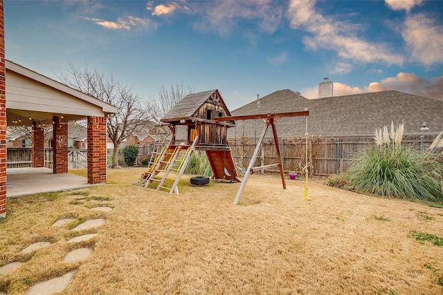 view of jungle gym with a patio