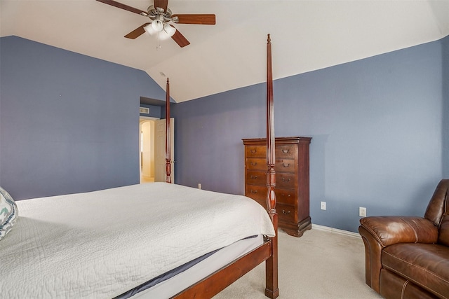 bedroom with lofted ceiling, light carpet, and ceiling fan