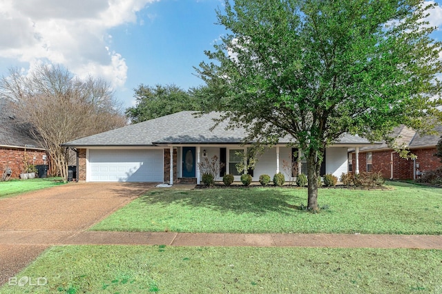 ranch-style house featuring a garage and a front yard