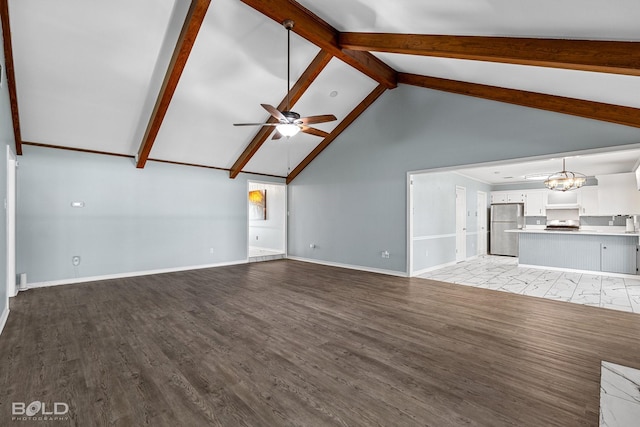 unfurnished living room with high vaulted ceiling, ceiling fan with notable chandelier, beam ceiling, and light hardwood / wood-style flooring