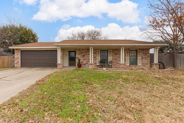 single story home with a garage and a front yard