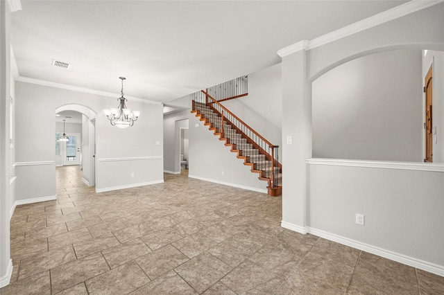 unfurnished room with an inviting chandelier and crown molding