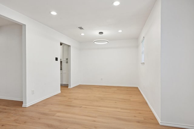 3404 Peachtree Ln, Pantego, TX 76013 - empty room featuring recessed lighting, light wood-style floors, and baseboards