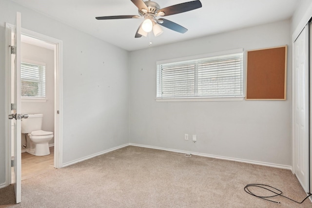 3404 Peachtree Ln, Pantego, TX 76013 - unfurnished bedroom featuring carpet flooring, multiple windows, a closet, and baseboards