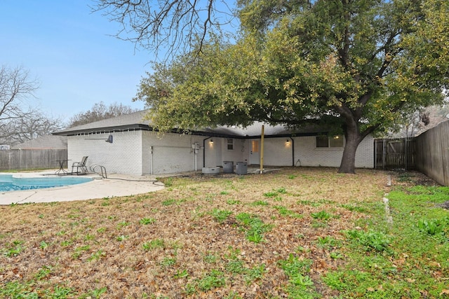 3404 Peachtree Ln, Pantego, TX 76013 - back of house featuring brick siding and a fenced backyard