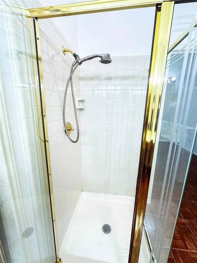 bathroom with an enclosed shower