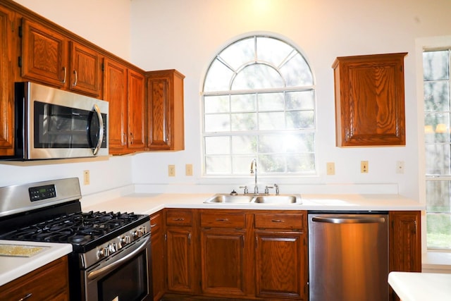 kitchen featuring stainless steel appliances and sink