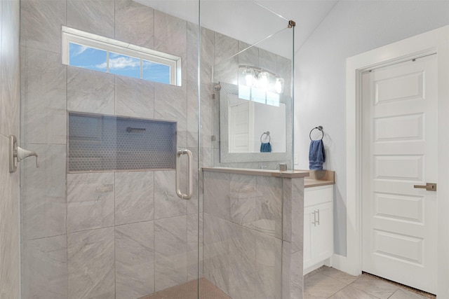 bathroom with vaulted ceiling and walk in shower