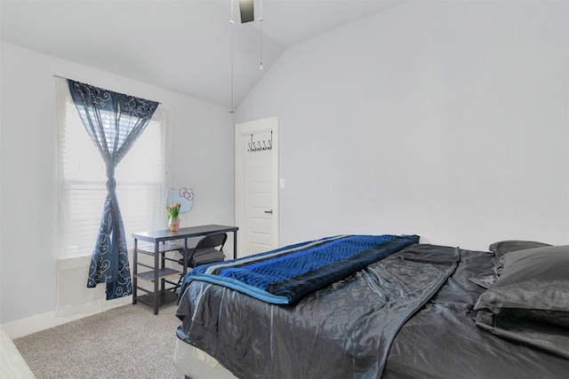 bedroom featuring vaulted ceiling, carpet flooring, and ceiling fan