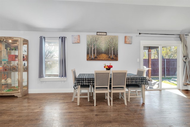 dining area with hardwood / wood-style flooring