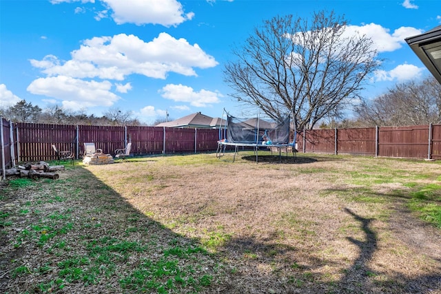 view of yard featuring a trampoline