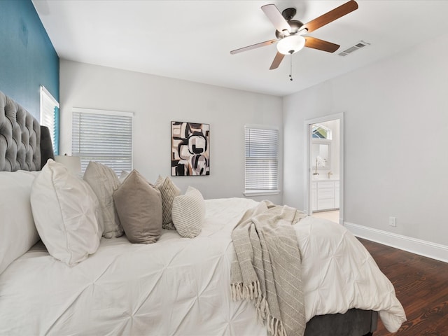 bedroom with ceiling fan, wood-type flooring, and ensuite bathroom