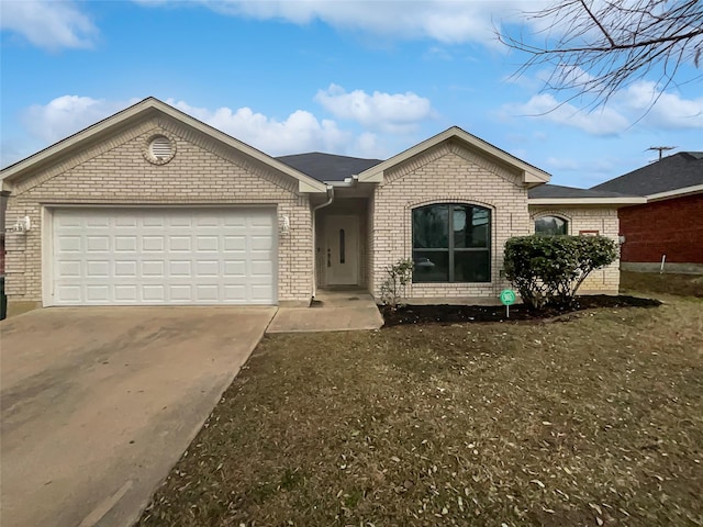 single story home featuring a garage and a front lawn