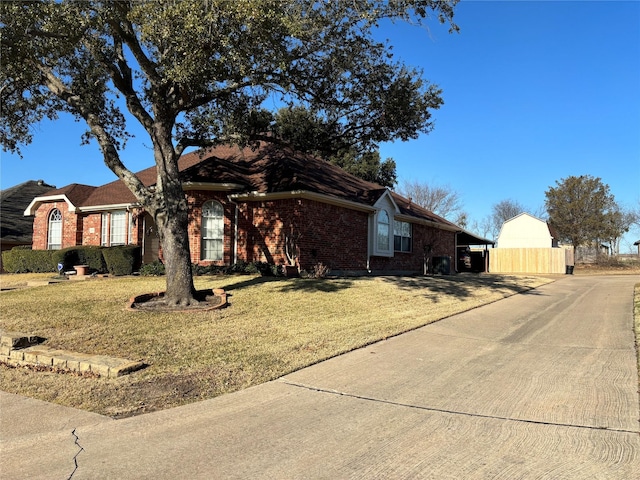 single story home featuring a front yard