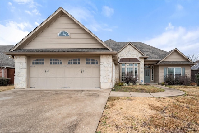 view of front of property with a garage