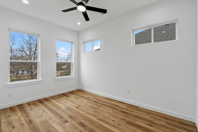 empty room featuring light hardwood / wood-style floors and ceiling fan