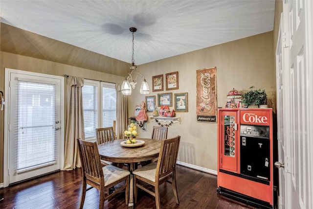 dining space featuring dark hardwood / wood-style flooring