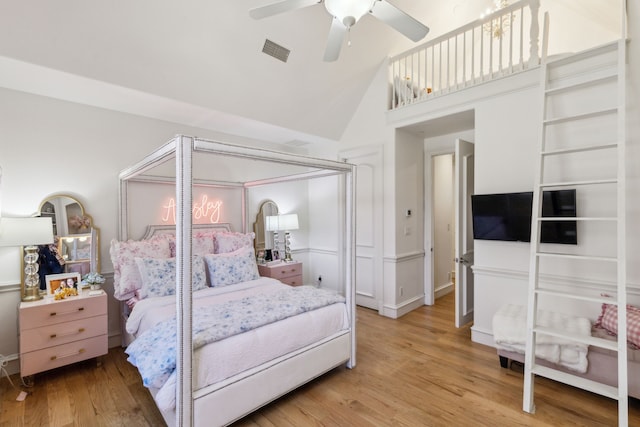 650 Maple Creek Dr, Fairview, TX 75069 - bedroom featuring light wood-style flooring, high vaulted ceiling, and a ceiling fan
