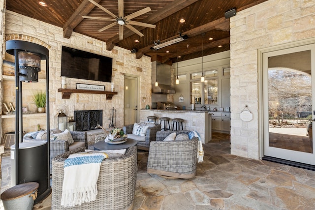 650 Maple Creek Dr, Fairview, TX 75069 - view of patio with ceiling fan, an outdoor living space with a fireplace, and an outdoor kitchen