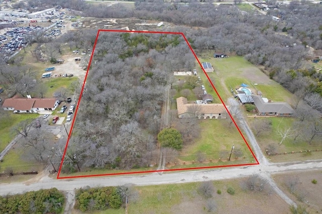 birds eye view of property featuring a rural view