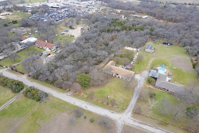 birds eye view of property with a rural view