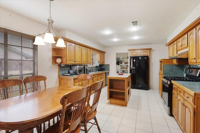 kitchen featuring stainless steel appliances, visible vents, under cabinet range hood, and open shelves