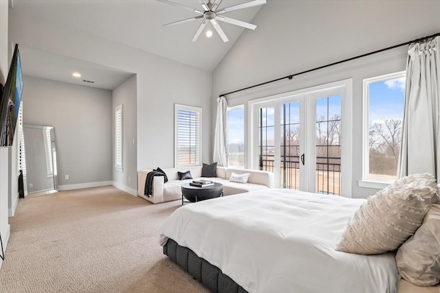 bedroom featuring french doors, light colored carpet, ceiling fan, and high vaulted ceiling