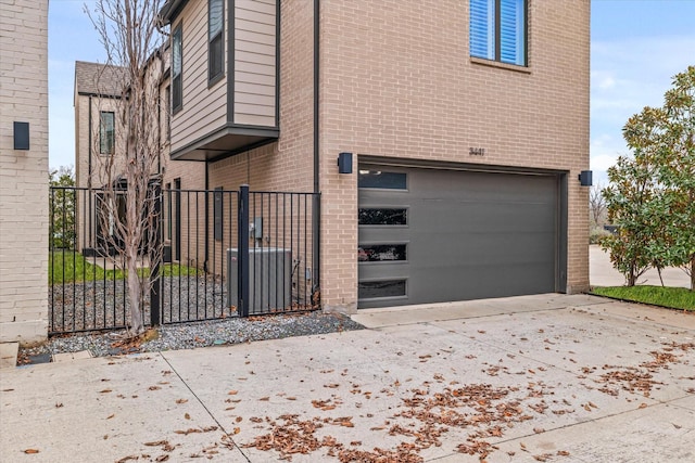 view of side of home with a garage