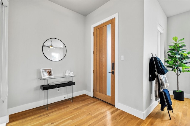 foyer entrance with hardwood / wood-style floors