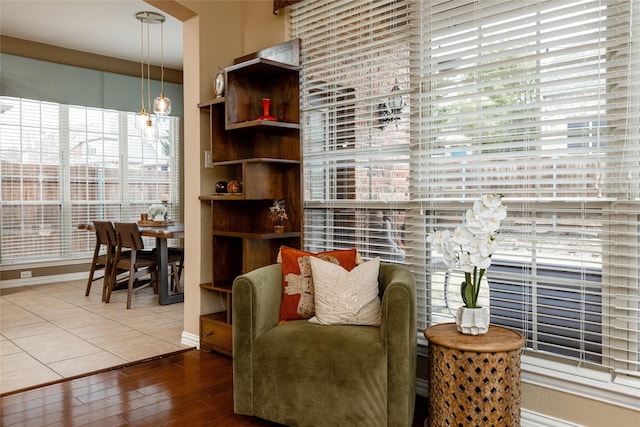 sitting room featuring tile patterned flooring