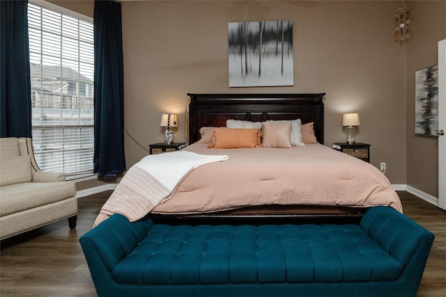 bedroom featuring dark wood-type flooring