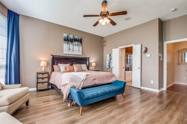 9720 Birdville Way, Fort Worth, TX 76244 - bedroom featuring wood finished floors, baseboards, ensuite bathroom, and multiple windows