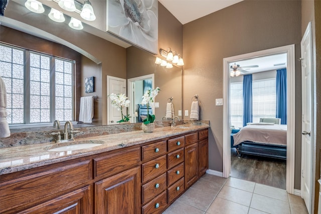 9720 Birdville Way, Fort Worth, TX 76244 - ensuite bathroom with tile patterned floors, baseboards, double vanity, and ceiling fan