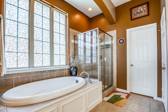 9720 Birdville Way, Fort Worth, TX 76244 - bathroom featuring a stall shower, a bath, and tile patterned floors