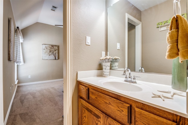 9720 Birdville Way, Fort Worth, TX 76244 - bathroom with vaulted ceiling, vanity, and baseboards