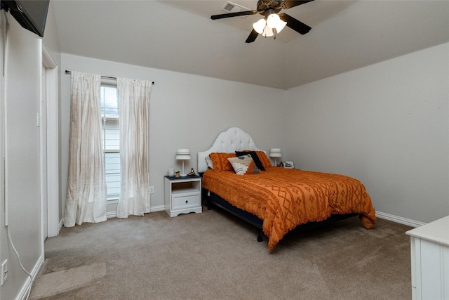 carpeted bedroom with lofted ceiling and ceiling fan