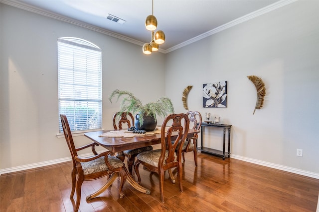 9720 Birdville Way, Fort Worth, TX 76244 - dining room featuring wood finished floors, crown molding, and baseboards