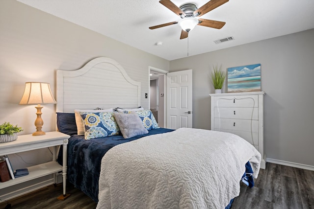 bedroom featuring dark wood-type flooring and ceiling fan