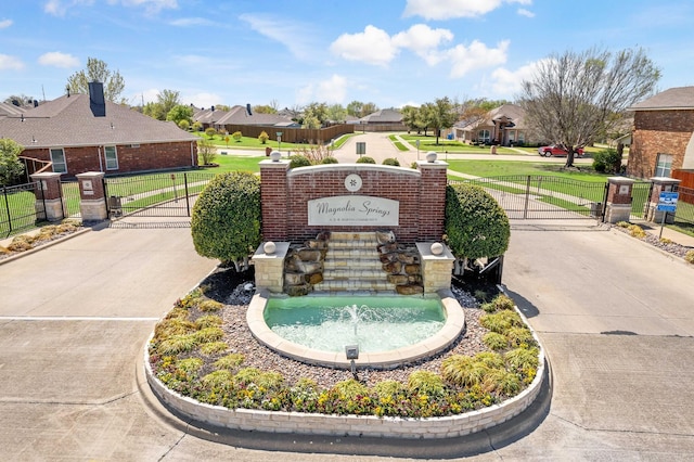 view of community with a yard