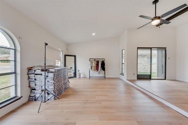 2410 Cedar Elm Ln, Garland, TX 75043 - interior space featuring light wood finished floors, ceiling fan, baseboards, recessed lighting, and lofted ceiling