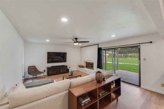 2410 Cedar Elm Ln, Garland, TX 75043 - living room with light wood-type flooring, recessed lighting, a ceiling fan, and baseboards