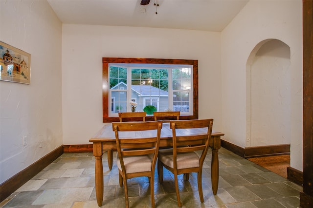 dining space with ceiling fan