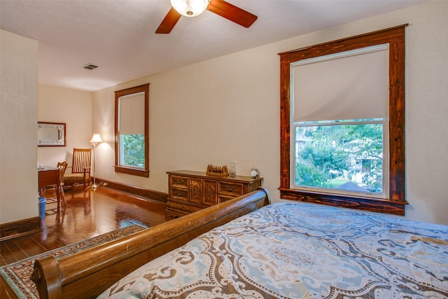 bedroom featuring wood-type flooring and ceiling fan