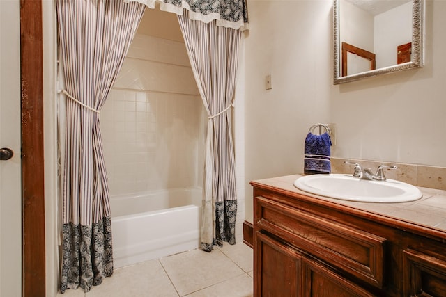 bathroom with vanity, tile patterned floors, and shower / bath combo