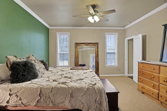 carpeted bedroom featuring ornamental molding and ceiling fan