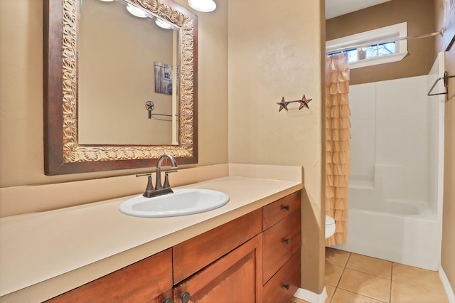 bathroom featuring shower / tub combo with curtain, vanity, and tile patterned flooring