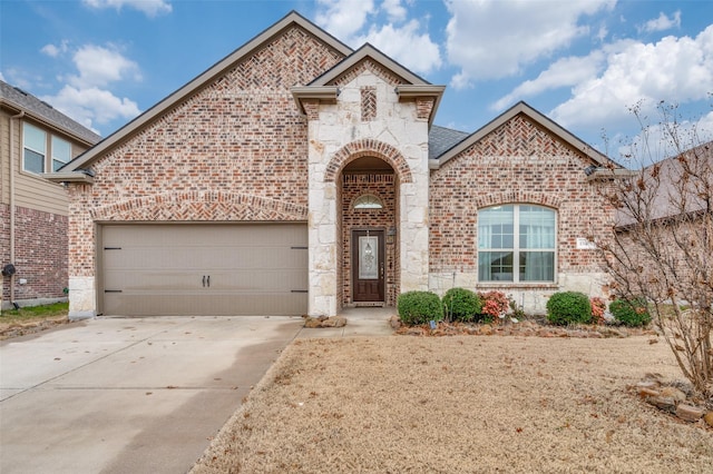 view of front of property with a garage