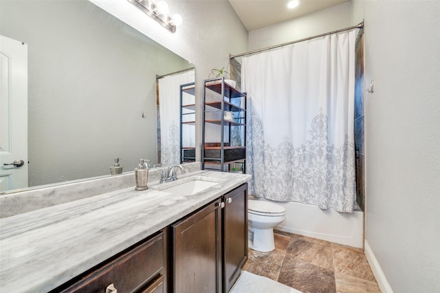15805 Rockingham St, Frisco, TX 75036 - bathroom with vanity, toilet, shower / bathtub combination with curtain, and baseboards